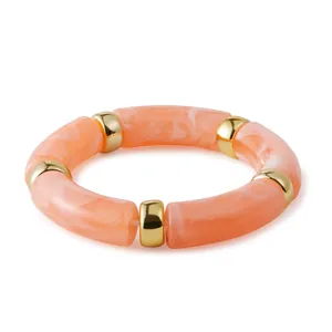 Bohemian orange marble acrylic stretch bracelet with gold metal spacer beads