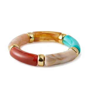 Bohemian acrylic stretch bracelet with marbled resin tubes and gold metal spacers