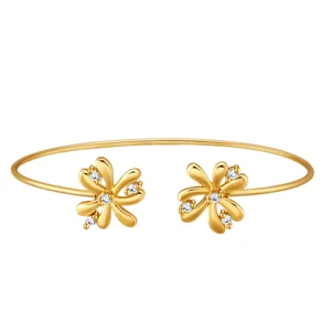 18K gold-plated brass open bangle with floral leaf design and zircon stones