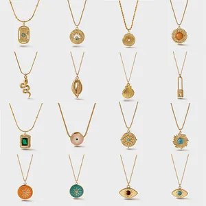 Collection of 16 gold stainless steel necklaces featuring sunburst and floral pendants