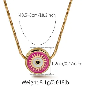 Detail of pink enamel evil eye pendant on gold snake chain with size measurements