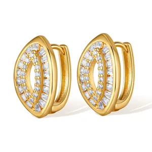 Detail of 18K gold plated oval hoop earrings with marquise-cut white zircon pavé setting