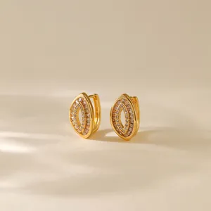 Irregular oval hoop earrings with 18K gold plating and pavé cubic zirconia inlay