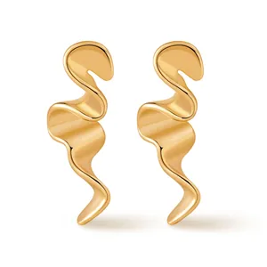 Detailed view of irregular 18K gold plated wavy earrings with a polished mirror finish