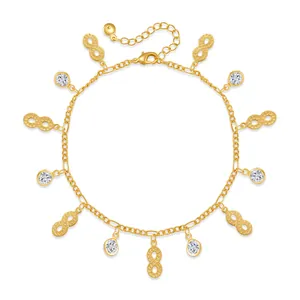 Detail of 18K gold plated infinity charm anklet with sparkling round zircon stones