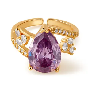 18K gold bohemian ring with pear-shaped purple zircon and marquise stones