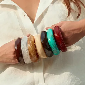 Wide acrylic resin bangle set with colorful marble patterns in Bohemian vintage style
