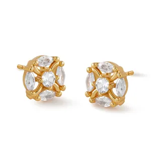 Macro shot of 18K gold-plated flower stud earrings with marquise-cut cubic zirconia