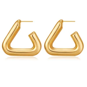 Modern gold chunky geometric C-shape stud earrings with a high-polished mirror finish
