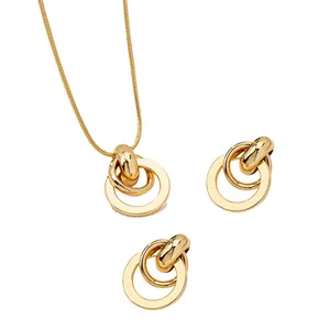 Polished gold geometric jewelry set featuring interlocking rings necklace and earrings