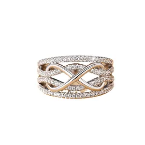 Multi-layer infinity ring in silver and rose gold with pavé set cubic zirconia crystals