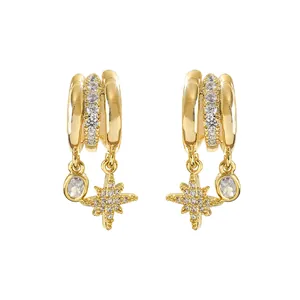 Boucles d'oreilles créoles dorées avec breloques étoiles et zircons étincelants