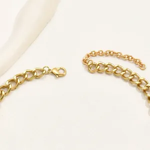 Exaggerated gold chunky chain necklace with red glass ruby for women in modern style