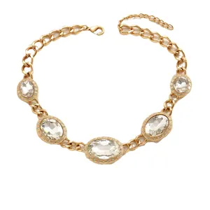 Luxurious gold necklace with five symmetrical oval crystals and thick chain link design