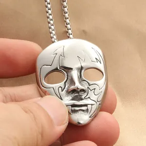 Silver vampire mask pendant in retro punk style made of polished stainless steel