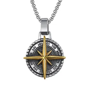 Vintage steel compass necklace with two-tone gold star pendant on a silver box chain