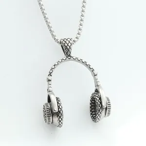 Detailed view of punk style headphone pendant with vintage grid texture and box chain