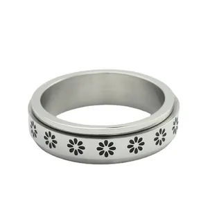 Punk style stainless steel daisy spinner ring with rotating black flower patterns