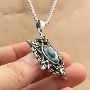 Gothic punk pentagram pendant with blue evil eye on stainless steel necklace