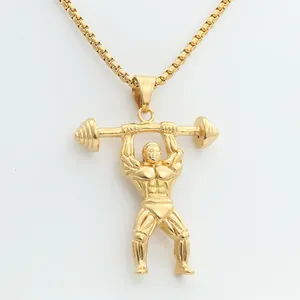 Close-up of golden weightlifter pendant with box chain showing detailed muscle texture