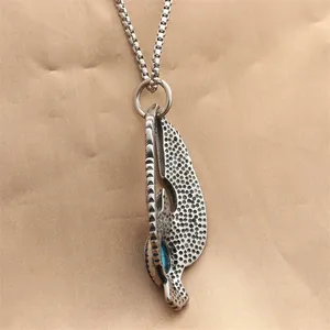 Vintage eagle turquoise pendant in stainless steel with punk textured wing design