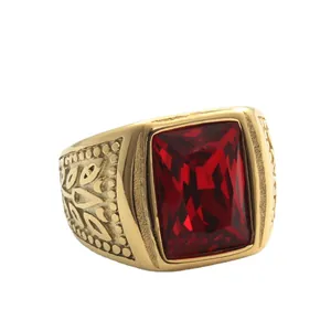 Vintage gold stainless steel ring with rectangular red gemstone and engraved patterns