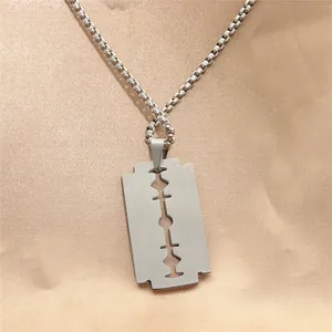 Punk style stainless steel razor blade pendant necklace with a brushed silver finish