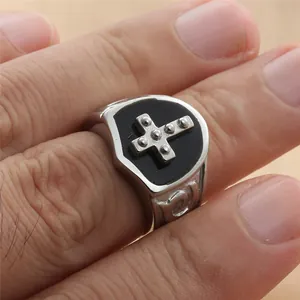 Vintage stainless steel cross ring for men with black enamel shield and retro embossed patterns