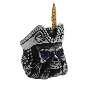 Retro punk pirate skull ring for men with blue gem eyes and golden feather detailing