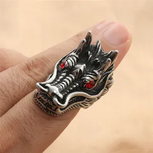 Retro punk titanium steel dragon head ring with red rhinestone eyes and vintage finish