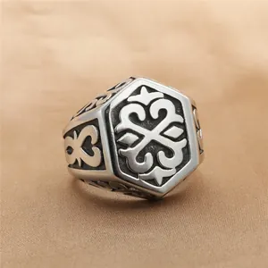Vintage stainless steel hexagonal ring with punk tribal patterns and gothic metal texture