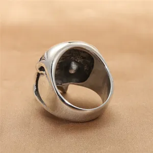 Vintage stainless steel skull ring with punk style diamond accent and silver finish