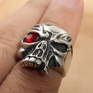 Vintage stainless steel skull ring for men with red gemstone eye in punk style