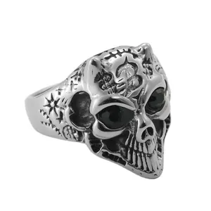 Retro punk style skull ring in stainless steel with black gemstones and dollar symbol