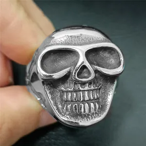 Vintage punk skull ring in polished stainless steel with gothic skull relief detail