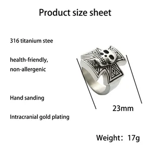 Vintage punk skull cross ring in 316 titanium steel with an antique finish for men