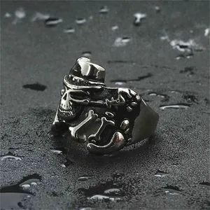 Retro punk rock skull ring with top hat in aged stainless steel for men
