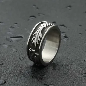 Vintage stainless steel dragon feather ring with antique finish and embossed patterns