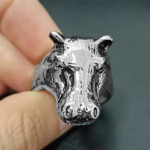 Macro shot of hippo head punk ring in vintage steel finish with detailed texture