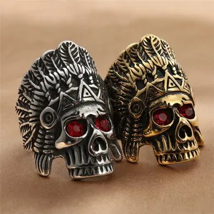 Vintage punk skull rings with red eyes and chieftain feather headdress in gold and silver
