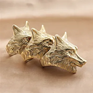 Punk style stainless steel wolf head ring set in gold finish with red crystal eyes