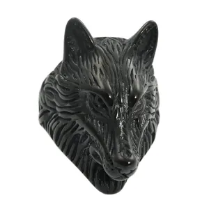 Close-up of black punk wolf head ring showing realistic animal carving details
