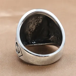 Vintage eagle ring for men in retro silver stainless steel with shield relief detail