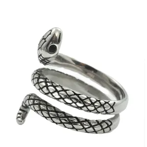 Detailed close-up of punk snake ring showing intricate scales and coiled metal design