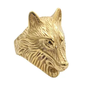 Detailed side view of 3D golden wolf head ring with intricate textured fur carving
