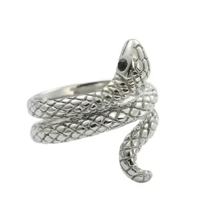 Detailed view of silver snake ring with scale texture and black gem eye setting