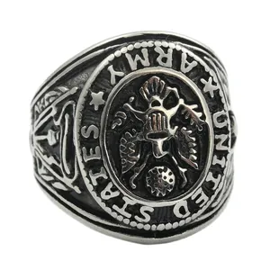 Macro detail of retro United States Army eagle emblem on stainless steel military ring