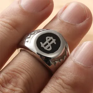Retro stainless steel ring with dollar sign on black base and engraved side details