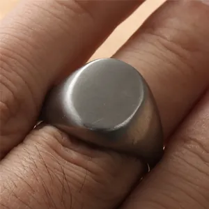 Vintage oval signet ring for men in brushed titanium steel with a minimalist matte finish