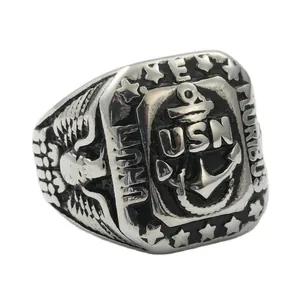 Vintage stainless steel USN anchor ring with eagle relief and military star details